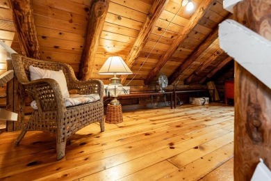 Welcome to this authentic Cape Cod-style log cabin in the heart on Apple Valley Golf Course in Ohio - for sale on GolfHomes.com, golf home, golf lot