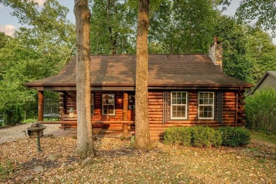 Welcome to this authentic Cape Cod-style log cabin in the heart on Apple Valley Golf Course in Ohio - for sale on GolfHomes.com, golf home, golf lot
