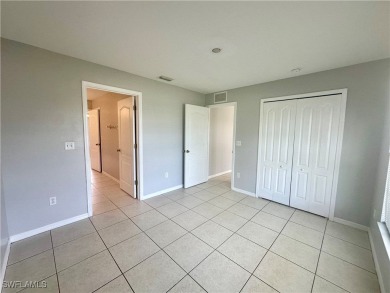Dreaming of Southwest Florida living? Check out this move-in on Palmetto-Pine Country Club in Florida - for sale on GolfHomes.com, golf home, golf lot