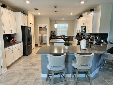 Beautiful newer 4BR/3BA home in the highly desirable gated on ChampionsGate Golf Resort in Florida - for sale on GolfHomes.com, golf home, golf lot