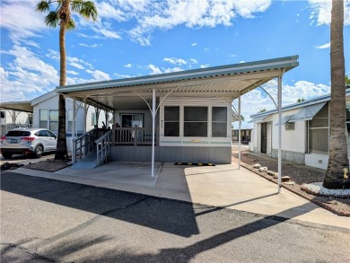 This home is immaculate. Well maintained. Fabulous front deck on Riverview Golf Course in Arizona - for sale on GolfHomes.com, golf home, golf lot