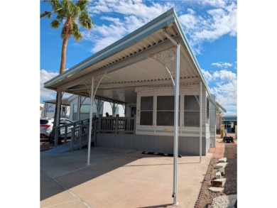 This home is immaculate. Well maintained. Fabulous front deck on Riverview Golf Course in Arizona - for sale on GolfHomes.com, golf home, golf lot