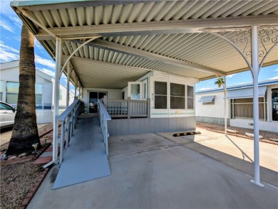 This home is immaculate. Well maintained. Fabulous front deck on Riverview Golf Course in Arizona - for sale on GolfHomes.com, golf home, golf lot