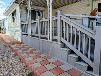 This home is immaculate. Well maintained. Fabulous front deck on Riverview Golf Course in Arizona - for sale on GolfHomes.com, golf home, golf lot