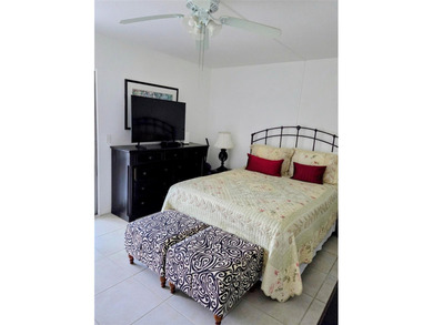 ITS ALL ABOUT THE LANAI & THE VIEWS IN THIS Bright and inviting on Hillsboro Pines Golf in Florida - for sale on GolfHomes.com, golf home, golf lot