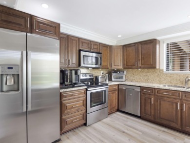 Welcome to this beautifully updated 2 bed, 2 bath, 2nd floor on Indian Spring Golf and Country Club in Florida - for sale on GolfHomes.com, golf home, golf lot