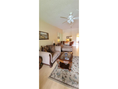 Pond View, spacious second floor furnished 2 bedroom, 2 bath on Tarpon Woods Golf Club in Florida - for sale on GolfHomes.com, golf home, golf lot