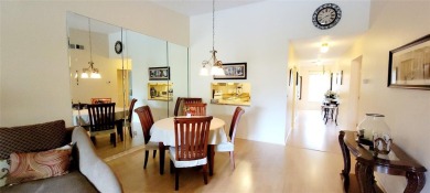 Pond View, spacious second floor furnished 2 bedroom, 2 bath on Tarpon Woods Golf Club in Florida - for sale on GolfHomes.com, golf home, golf lot