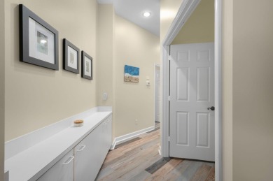 This beautifully laid-out home is ready for you to enjoy or use on Meadowood Golf and Tennis Club in Florida - for sale on GolfHomes.com, golf home, golf lot