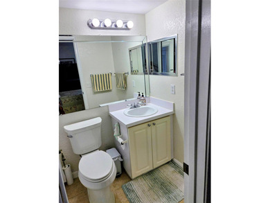 ITS ALL ABOUT THE LANAI & THE VIEWS IN THIS Bright and inviting on Hillsboro Pines Golf in Florida - for sale on GolfHomes.com, golf home, golf lot