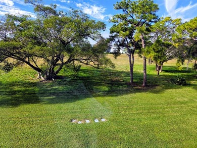 ITS ALL ABOUT THE LANAI & THE VIEWS IN THIS Bright and inviting on Hillsboro Pines Golf in Florida - for sale on GolfHomes.com, golf home, golf lot