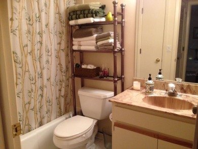 Pond View, spacious second floor furnished 2 bedroom, 2 bath on Tarpon Woods Golf Club in Florida - for sale on GolfHomes.com, golf home, golf lot