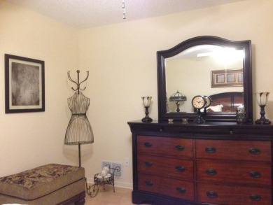 Pond View, spacious second floor furnished 2 bedroom, 2 bath on Tarpon Woods Golf Club in Florida - for sale on GolfHomes.com, golf home, golf lot