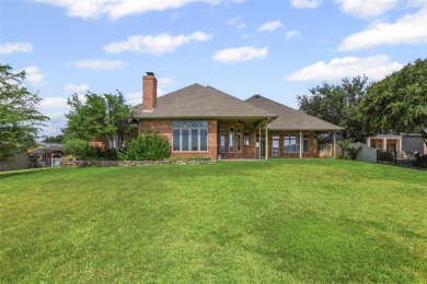 Welcome to this stunning waterfront home on Lake Granbury on Harbor Lakes Golf Club in Texas - for sale on GolfHomes.com, golf home, golf lot