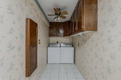 Welcome to life in Dobson Ranch!
This 4-bedroom, 2-bathroom home on Dobson Ranch Municipal Golf Course in Arizona - for sale on GolfHomes.com, golf home, golf lot