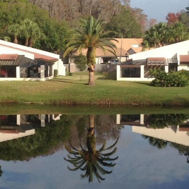 Pond View, spacious second floor furnished 2 bedroom, 2 bath on Tarpon Woods Golf Club in Florida - for sale on GolfHomes.com, golf home, golf lot