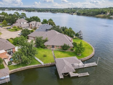 Welcome to this stunning waterfront home on Lake Granbury on Harbor Lakes Golf Club in Texas - for sale on GolfHomes.com, golf home, golf lot
