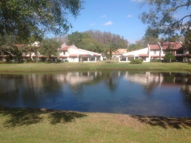Pond View, spacious second floor furnished 2 bedroom, 2 bath on Tarpon Woods Golf Club in Florida - for sale on GolfHomes.com, golf home, golf lot