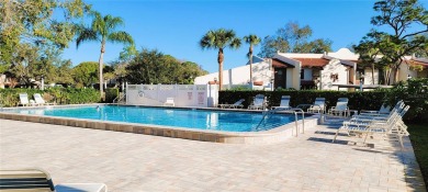 Pond View, spacious second floor furnished 2 bedroom, 2 bath on Tarpon Woods Golf Club in Florida - for sale on GolfHomes.com, golf home, golf lot