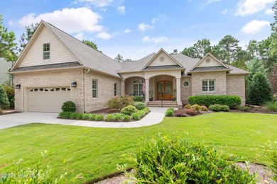 Step into luxury coastal living with this impeccable residence on Members Club At St. James Plantation in North Carolina - for sale on GolfHomes.com, golf home, golf lot
