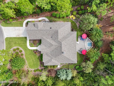 Step into luxury coastal living with this impeccable residence on Members Club At St. James Plantation in North Carolina - for sale on GolfHomes.com, golf home, golf lot