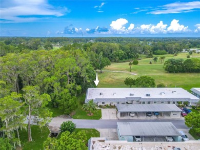 Under contract-accepting backup offers. This 2-bedroom, 2-bath on Seven Springs Golf and Country Club in Florida - for sale on GolfHomes.com, golf home, golf lot