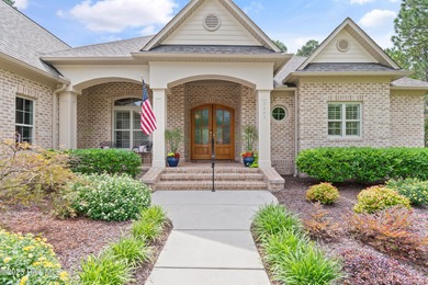 Step into luxury coastal living with this impeccable residence on Members Club At St. James Plantation in North Carolina - for sale on GolfHomes.com, golf home, golf lot