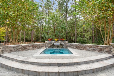 Step into luxury coastal living with this impeccable residence on Members Club At St. James Plantation in North Carolina - for sale on GolfHomes.com, golf home, golf lot
