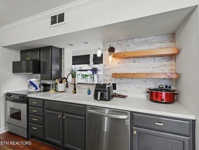 This luxurious, modern, golf course-front condo located in Fox on  in Tennessee - for sale on GolfHomes.com, golf home, golf lot