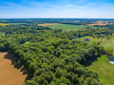 3-acres of heavily wooded landscape with mature trees, provides on Rattlesnake Ridge Golf Club in Ohio - for sale on GolfHomes.com, golf home, golf lot