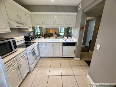 CORNER ground floor 2/2 unit RARELY available in sought-after on Wynmoor Golf Course in Florida - for sale on GolfHomes.com, golf home, golf lot