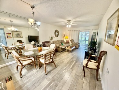 CORNER ground floor 2/2 unit RARELY available in sought-after on Wynmoor Golf Course in Florida - for sale on GolfHomes.com, golf home, golf lot
