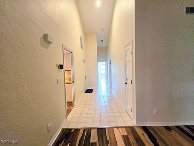 Enjoy panoramic unobstructed golf course & lake views with a on Cross Creek Country Club in Florida - for sale on GolfHomes.com, golf home, golf lot