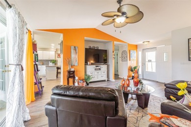 PICTURE PERFECT and perched on a large, serene POND, this on Tampa Bay Golf and Country Club in Florida - for sale on GolfHomes.com, golf home, golf lot