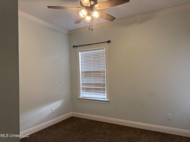 Nestled near the scenic Hickory Hills Golf Course, this charming on Mississippi National Golf Course in Mississippi - for sale on GolfHomes.com, golf home, golf lot
