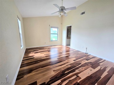 Enjoy panoramic unobstructed golf course & lake views with a on Cross Creek Country Club in Florida - for sale on GolfHomes.com, golf home, golf lot