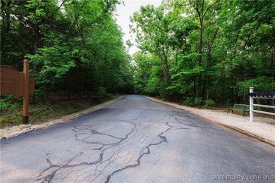 Build your lake dream on this beautiful .34-acre lot located in on Bear Creek Valley Golf Club in Missouri - for sale on GolfHomes.com, golf home, golf lot