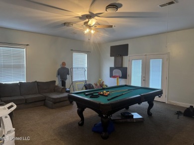 Nestled near the scenic Hickory Hills Golf Course, this charming on Mississippi National Golf Course in Mississippi - for sale on GolfHomes.com, golf home, golf lot