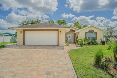 PICTURE PERFECT and perched on a large, serene POND, this on Tampa Bay Golf and Country Club in Florida - for sale on GolfHomes.com, golf home, golf lot