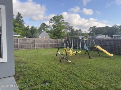 Nestled near the scenic Hickory Hills Golf Course, this charming on Mississippi National Golf Course in Mississippi - for sale on GolfHomes.com, golf home, golf lot