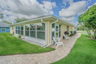 PICTURE PERFECT and perched on a large, serene POND, this on Tampa Bay Golf and Country Club in Florida - for sale on GolfHomes.com, golf home, golf lot