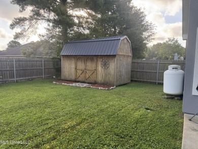 Nestled near the scenic Hickory Hills Golf Course, this charming on Mississippi National Golf Course in Mississippi - for sale on GolfHomes.com, golf home, golf lot