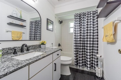 PICTURE PERFECT and perched on a large, serene POND, this on Tampa Bay Golf and Country Club in Florida - for sale on GolfHomes.com, golf home, golf lot