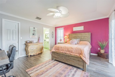 PICTURE PERFECT and perched on a large, serene POND, this on Tampa Bay Golf and Country Club in Florida - for sale on GolfHomes.com, golf home, golf lot