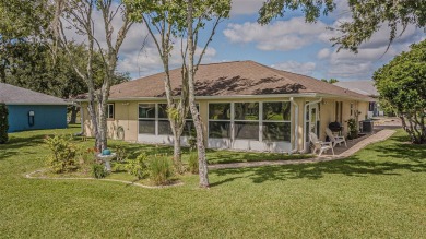 PICTURE PERFECT and perched on a large, serene POND, this on Tampa Bay Golf and Country Club in Florida - for sale on GolfHomes.com, golf home, golf lot