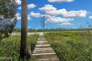 Waterfront homesite with extensive dock frontage in the gated on Harbour Point Golf Club in North Carolina - for sale on GolfHomes.com, golf home, golf lot
