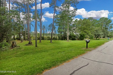 Waterfront homesite with extensive dock frontage in the gated on Harbour Point Golf Club in North Carolina - for sale on GolfHomes.com, golf home, golf lot