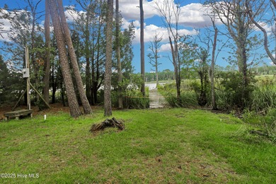 Waterfront homesite with extensive dock frontage in the gated on Harbour Point Golf Club in North Carolina - for sale on GolfHomes.com, golf home, golf lot