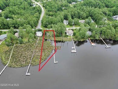 Waterfront homesite with extensive dock frontage in the gated on Harbour Point Golf Club in North Carolina - for sale on GolfHomes.com, golf home, golf lot
