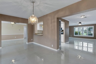 One of the Highlights of this spacious 1567 Sq Ft, 2-bedroom on Highland Lakes Executive Golf Course in Florida - for sale on GolfHomes.com, golf home, golf lot